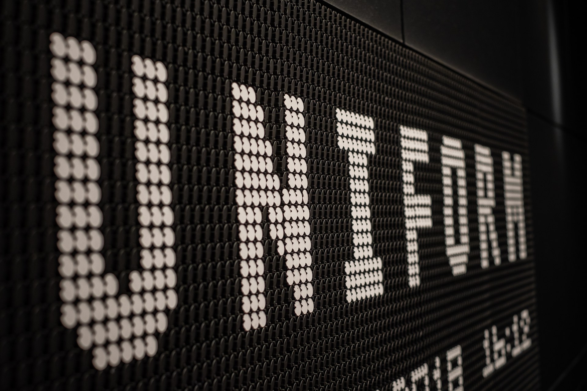 Illuminated Uniform lettering on the studio wall