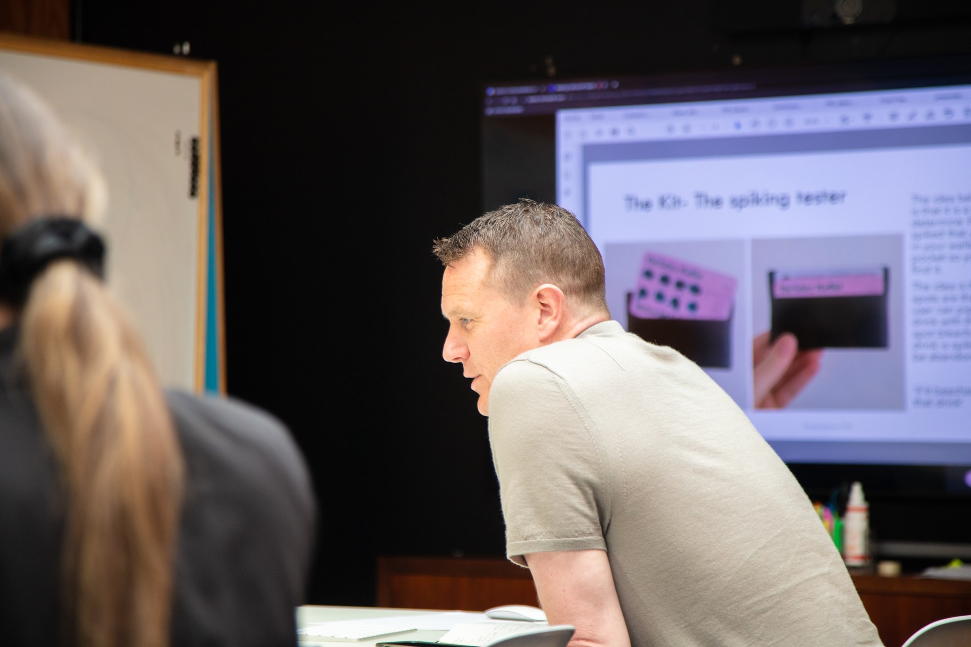 Uniform colleagues gathered for a presentation in the studio